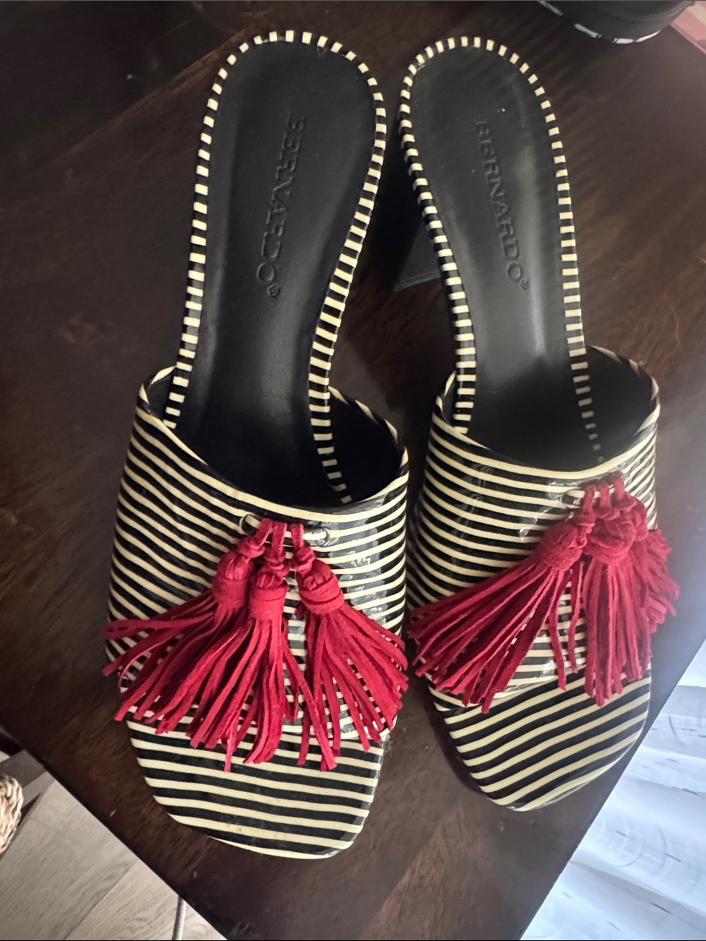 Bernardo Black and Cream Striped Slide Mules with Red Tassels
